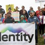 Participants in the Two Spirit Pride March gather at Soldotna Creek Park Wednesday. About 60 people turned out to celebrate June LGBTQ Pride Month. (Photo by Erin Thompson/Peninsula Clarion)