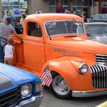 Vintage vehicles owned by members of the Kaknu Kruzers Car Club gather before Kenai&rsquo;s Fourth of July parade on Wednesday, July 4, 2018 in Kenai, Alaska. (Ben Boettger/Peninsula Clarion)