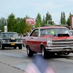 Members of the Kaknu Kruzers Car Club drive down Main Street Loop in Kenai&rsquo;s Fourth of July parade on Wednesday, July 4, 2018 in Kenai, Alaska (Ben Boettger/Peninsula Clarion)