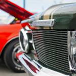 Darrell Aleckson&rsquo;s restored Plymouth Barracuda, a classic 1960s car, sits in a parking lot alongside other restored classic cars at a Kaknu Kruzers&rsquo; car show at Autozone on Saturday, June 30, 2018 in Soldotna, Alaska. The Kaknu Kruzers, a local club composed of members who restore classic cars, will participate in a number of parades and shows this summer, including Soldotna&rsquo;s Progress Days parade on July 28. (Photo by Elizabeth Earl/Peninsula Clarion)