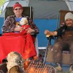 Anchorage residents Herb Morgan, left, and Tek Kniaziowski take a break on the beach on opening day of the three-week dipnetting season in Kenai, Alaska. The two, who were camping on the beach, travel to the peninsula annually to participate in the fish harvest. Kniaziowski said the fishing was slow going so far &mdash; by mid-afternoon the two had caught six flounders, but no salmon. (Photo by Erin Thompson/Peninsula Clarion)