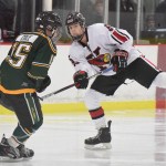 Kenai Central junior Levi Mese battles against Colony defender Dayne Cole, Thursday night at the Kenai Multipurpose Facility. (Photo by Joey Klecka/Peninsula Clarion)