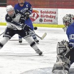 Soldotna forward Galen Brantley III fires a shot wide on Palmer goalie Cody Grogan on Friday at the Soldotna Regional Sports Complex. (Photo by Jeff Helminiak/Peninsula Clarion)