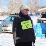 Soldotna resident Larissa Arbelovsky walks down Binkley Street in Soldotna with her 7-year-old niece, Ryan Queen, during a Women's March held Saturday, Jan. 21, 2017 in Soldotna, Alaska. Marchers held signs advocating for a number of issues, from women's reproductive rights to clean water. (Megan Pacer/Peninsula Clarion)