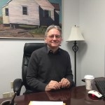 Alaska state Sen. Tom Begich poses in his Capitol office on Monday, Jan. 23, 2017, in Juneau, Alaska. Begich, a Democrat, has signed on as a co-sponsor of legislation that would restore the portion of Alaskans&rsquo; oil wealth checks cut by Gov. Bill Walker last year. (AP Photo/Becky Bohrer)