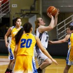 Nikiski senior Chena Litzen drives the lane for a layup midway through the third quarter Friday against Bethel at the Sullivan Arena. The Bulldogs won 37-22 to advance to Saturday's fourth-place game against ACS.