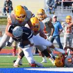 Soldotnas Hudson Metcalf (5) carries the ball against West Valleys Joseph Kimbrough (55) Friday at Justin Maile Field in Soldotna. (Photo by Joey Klecka/Peninsula Clarion)