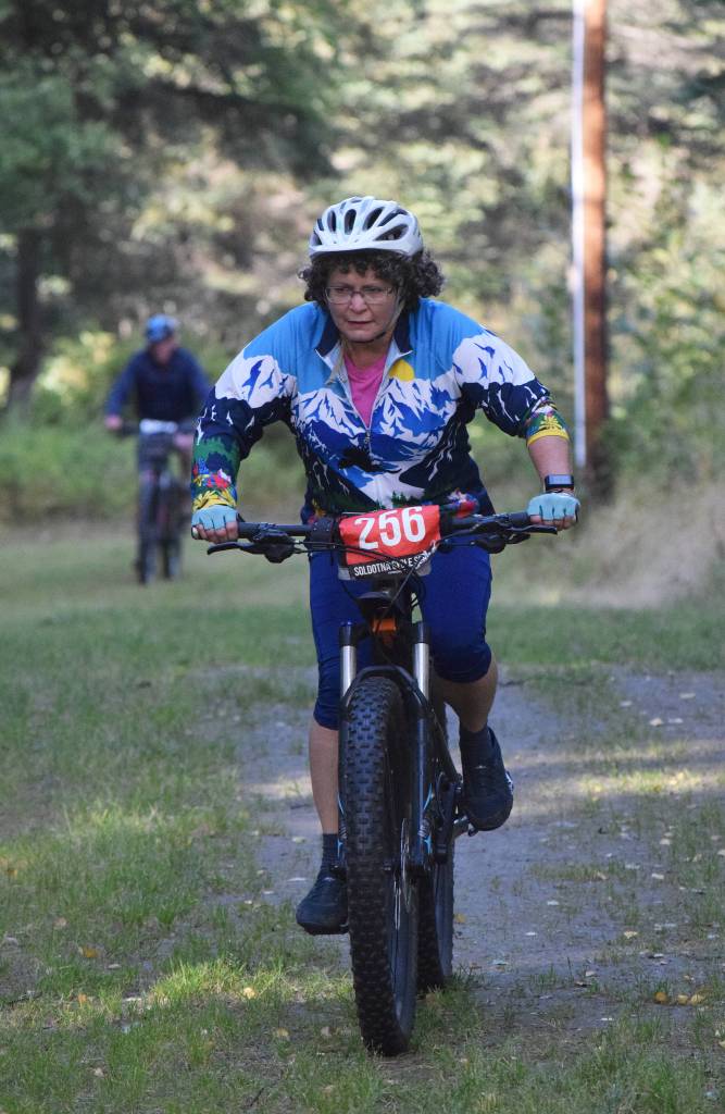 Wanda Kincaid races along the trail in the Soldotna Cycle Series season finale held Aug. 30, 2018, at the Tsalteshi Trails. (Photo by Joey Klecka/Peninsula Clarion)