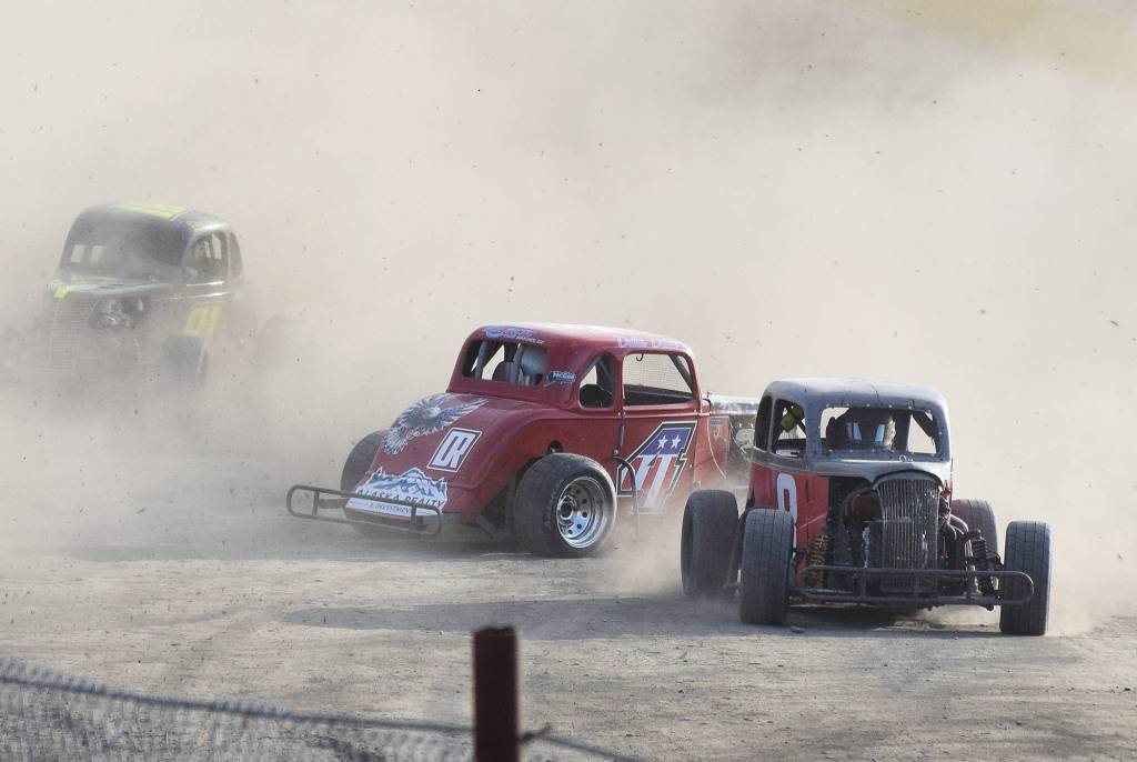 Aaron Creech (4) spins out Friday night in a Legends heat race at Twin City Raceway in Kenai. (Photo by Joey Klecka/Peninsula Clarion)