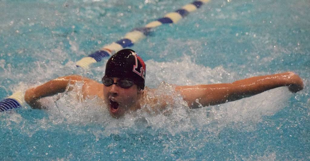 Kenai swimmer Peter Anderson races in the boys 50-yard butterfly Friday at the SoHi Pentathlon in the Soldotna High School pool. (Photo by Joey Klecka/Peninsula Clarion)
