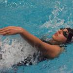 Kenai swimmer Rim Khayata competes in the girls 50-yard backstroke Friday at the SoHi Pentathlon in the Soldotna High School pool. (Photo by Joey Klecka/Peninsula Clarion)