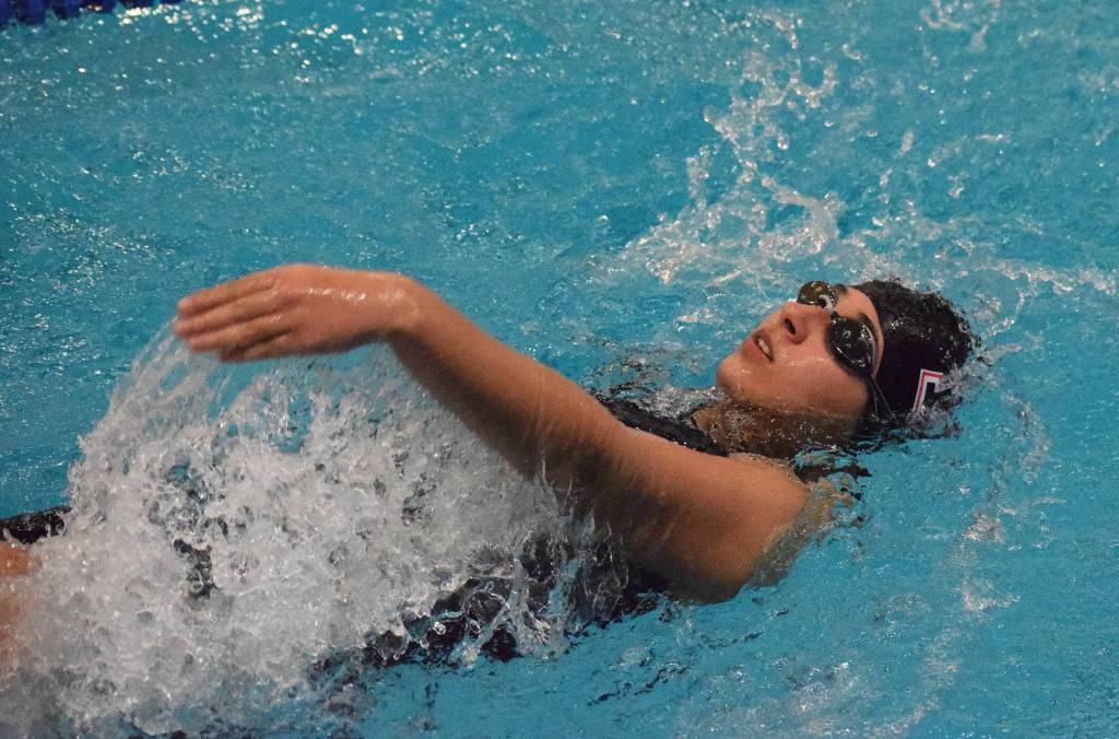 Kenai swimmer Rim Khayata competes in the girls 50-yard backstroke Friday at the SoHi Pentathlon in the Soldotna High School pool. (Photo by Joey Klecka/Peninsula Clarion)