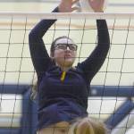 Homers Tonda Smude goes up for a block against Soldotna on Tuesday, Sept. 18, 2018, at Soldotna High School. (Photo by Jeff Helminiak/Peninsula Clarion)