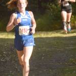 Palmers Katey Houser leads Wasillas Allison VanPelt with about a kilometer left in the Division I girls race at the Region 3 meet at Tsalteshi Trails on Saturday, Sept. 22, 2018. Houser won, while VanPelt was second. (Photo by Jeff Helminiak/Peninsula Clarion)