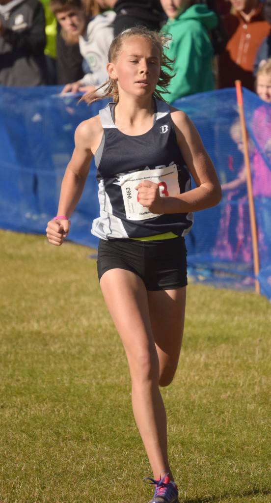Soldotna freshman Jordan Strausbaugh runs to third place in the Division I girls race at the Region 3 meet Saturday, Sept. 22, 2018, at Tsalteshi Trails. (Photo by Jeff Helminiak/Peninsula Clarion)