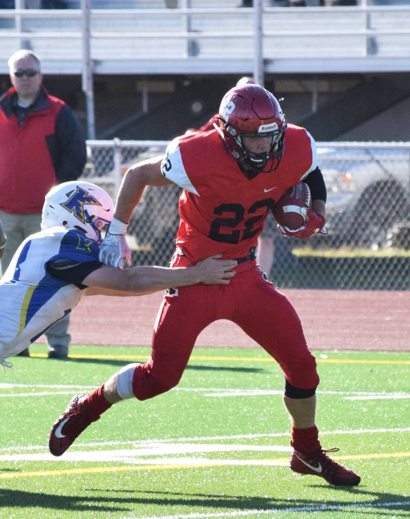 Kenai running back Titus Riddall scores a touchdown Saturday afternoon against Kodiak at Kenais Ed Hollier Field. (Photo by Joey Klecka/Peninsula Clarion)