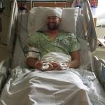 Nikiski firefighter Levi Doss reveals a smile while recovering from brain surgery in Anchorage in 2016. (Photo provided by Tera Doss)