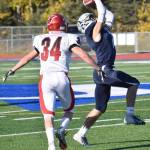 Soldotnas Wyatt Medcoff picks off Kenai Central quarterback Connor Felchle in front of intended receiver Joey Sylvester on Saturday, Sept. 29, 2018, at Justin Maile Field in Soldotna. (Photo by Jeff Helminiak/Peninsula Clarion)