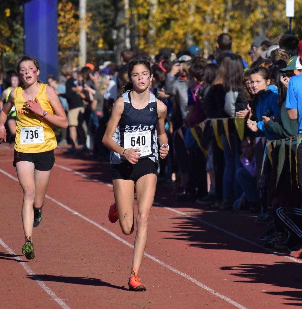 Soldotnas Erika Arthur approaches the finish of the Division I girls race Saturday at the ASAA state cross-country running championships at the Bartlett Trails in Anchorage. (Photo by Joey Klecka/Peninsula Clarion)