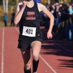 Kenai Central senior Jaycie Calvert sprints to the finish line to win the Division II girls state title Saturday at the ASAA state cross-country running championships at the Bartlett Trails in Anchorage. (Photo by Joey Klecka/Peninsula Clarion)