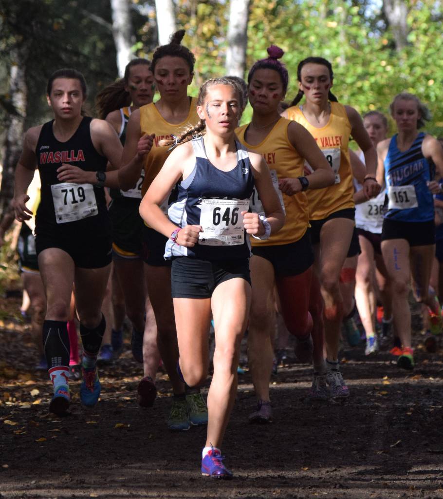 Soldotna freshman Jordan Strausbaugh (646) leads a pack of runners early in Saturdays Division I girls race at the ASAA state cross-country running championships at the Bartlett Trails in Anchorage. (Photo by Joey Klecka/Peninsula Clarion)