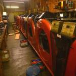 Pinsetting machines installed in the 1980s stand in the backroom of the Kenai bowling alley on Saturday, Nov. 14 in Kenai. The bowling alley is now owned by the city of Kenai, which will soon begin seeking management for it. (Ben Boettger/Peninsula Clarion)