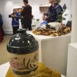 A clay pot sits displayed for interested buyers Thursday evening at the Clay on Display exhibit at the Kenai Fine Art Center. (Photo by Joey Klecka/Peninsula Clarion)