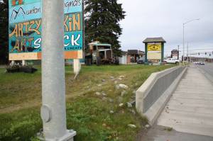 A grassy area adjacent to the Sterling Highway in Soldotna is photographed on Oct. 11. The corner is one of several that could be updated as part of the citys beautification plans. (Erin Thompson/Peninsula Clarion)