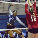 Soldotna junior Serena Foglia (15) sends a shot at Wasillas Cheyenne Green (16) Thursday at Soldotna High School. (Photo by Joey Klecka/Peninsula Clarion)