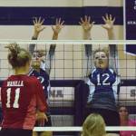 Soldotna senior Carsen Brown and junior Bailey Leach (12) put up a block on Wasillas Aleks Kvalheim (11) Thursday at Soldotna High School. (Photo by Joey Klecka/Peninsula Clarion)
