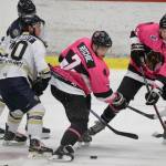Stanislav Dosek and Mason Salquist of the Janesville (Wisconsin) Jets and Logan Ritchie and Justin Daly of the Brown Bears work to gain possession of the puck Friday, Oct. 12, 2018, at the Soldotna Regional Sports Complex. (Photo by Jeff Helminiak/Peninsula Clarion)