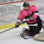 Kenai River Brown Bears forward Sutton McDonald tries to push the puck in front of the net against the Janesville (Wisconsin) Jets on Friday at the Soldotna Regional Sports Complex. (Photo by Jeff Helminiak/Peninsula Clarion)