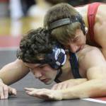 Kenai Centrals Tucker Vann controls Homers Josh Bradshaw on the way to the 160-pound championship at the Luke Spruill Memorial Tournament at Kenai Central High School on Saturday, Oct. 13, 2018. (Photo by Jeff Helminiak/Peninsula Clarion)