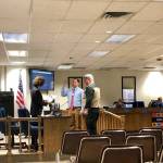 Mike Illg and Greg Madden are sworn into the Kenai Peninsula Borough School District Board of Education on Monday, Oct. 15, 2018, in Soldotna, AK. (Photo by Victoria Petersen/Peninsula Clarion)