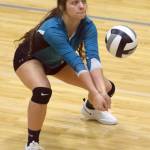 Nikiskis Emma Wik digs up a ball Tuesday, Oct. 16, 2018, against Soldotna at Nikiski High School. (Photo by Jeff Helminiak/Peninsula Clarion)