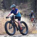 Soldotna youth rider Landon Showalter (front) leads mother Jen Showalter early in the Polar Vortex Cyclocross race Saturday at the Tsalteshi Trails in Soldotna. (Photo by Joey Klecka/Peninsula Clarion)