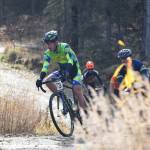 Anchorage rider Jamie Stull leads the front group in the Polar Vortex Cyclocross race Saturday at the Tsalteshi Trails in Soldotna. (Photo by Joey Klecka/Peninsula Clarion)