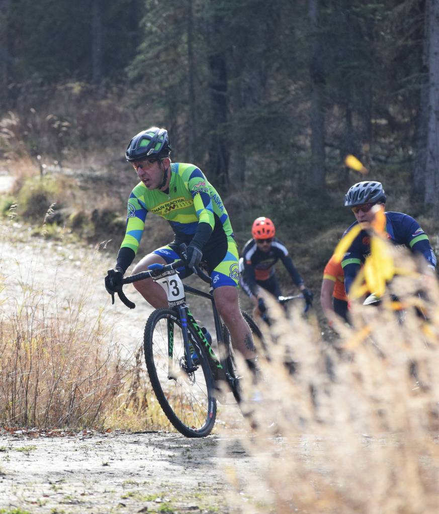 Anchorage rider Jamie Stull leads the front group in the Polar Vortex Cyclocross race Saturday at the Tsalteshi Trails in Soldotna. (Photo by Joey Klecka/Peninsula Clarion)