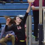 Kenai Central sophomore Abby Every puts down a hit Thursday night against the Stars at Soldotna High School. (Photo by Joey Klecka/Peninsula Clarion)