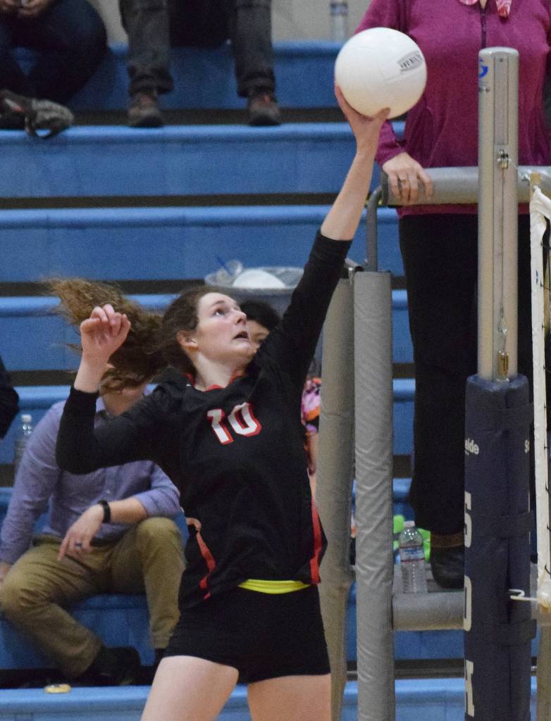 Kenai Central sophomore Abby Every puts down a hit Thursday night against the Stars at Soldotna High School. (Photo by Joey Klecka/Peninsula Clarion)
