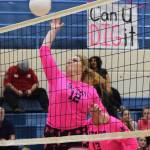 Soldotna junior Bailey Leach puts down a hit Thursday night against Kenai at Soldotna High School. (Photo by Joey Klecka/Peninsula Clarion)