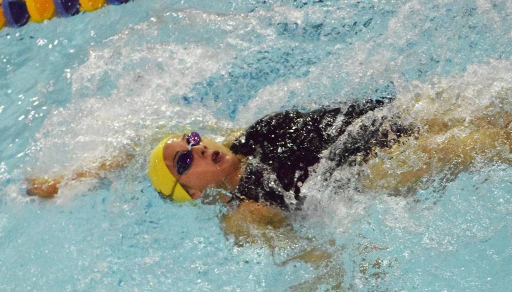 Homers Madison Story races in the girls 200-yard IM final Saturday at the Northern Lights Conference championship swim meet at Homer High School. (Photo by Joey Klecka/Peninsula Clarion)