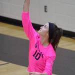 Soldotna senior Aliann Schmidt serves to Nikiski on Tuesday, Oct. 16, 2018, at Nikiski High School. (Photo by Jeff Helminiak/Peninsula Clarion)