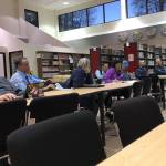 Parents, teachers, staff and concerned public gather at the Kenai Central High School library to listen to Superintendent Sean Dusek and Assistant Superintendent Dave Jones discuss the future Kenai Peninsula Borough School District budget on Tuesday in Kenai. (Photo by Victoria Petersen/Peninsula Clarion)