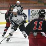 Soldotnas Galen Brantley III attacks against North Pole on Friday, Nov. 2, 2018, at the Soldotna Regional Sports Complex. (Photo by Jeff Helminiak/Peninsula Clarion)