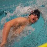 Kenai swimmer Trevor Bagley races in the boys 400-yard freestyle relay Saturday at the 2018 ASAA swimming and diving state championships at Bartlett High School. (Photo by Joey Klecka/Peninsula Clarion)