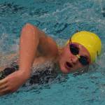 Homers Adeline Berry competes in the girls 200-yard freestyle final Saturday at the 2018 ASAA swimming and diving state championships at Bartlett High School. (Photo by Joey Klecka/Peninsula Clarion)