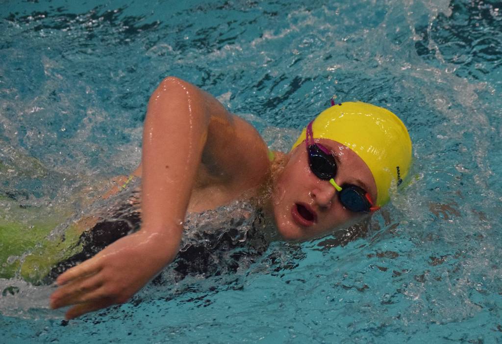 Homers Adeline Berry competes in the girls 200-yard freestyle final Saturday at the 2018 ASAA swimming and diving state championships at Bartlett High School. (Photo by Joey Klecka/Peninsula Clarion)