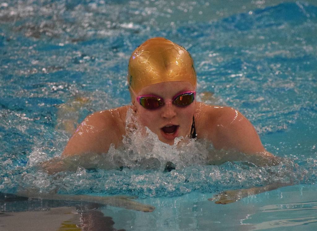 Sewards Lydia Jacoby races in the girls 100-yard breaststroke final Saturday at the 2018 ASAA swimming and diving state championships at Bartlett High School. (Photo by Joey Klecka/Peninsula Clarion)