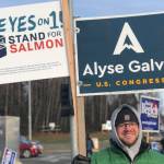 Nick Longobardi, a supporter of U.S. House District candidate Alyse Galvin holds signs at the intersection of the Sterling and Kenai Spur Highways on Tuesday, Nov. 6, 2018, in Soldotna, Alaska. (Photo by Victoria Petersen/Peninsula Clarion)